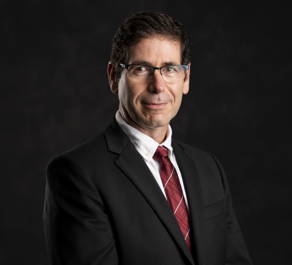 Phillip Kaufman portrait with dark background.